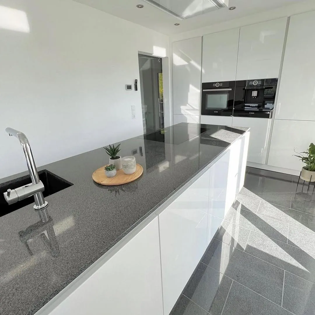 White kitchen with granite worktop