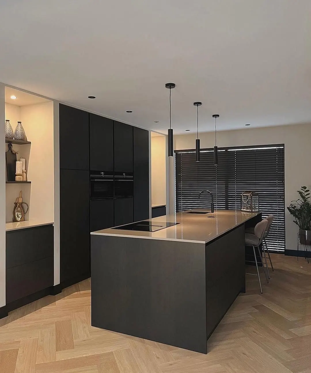 Dark island kitchen with timber