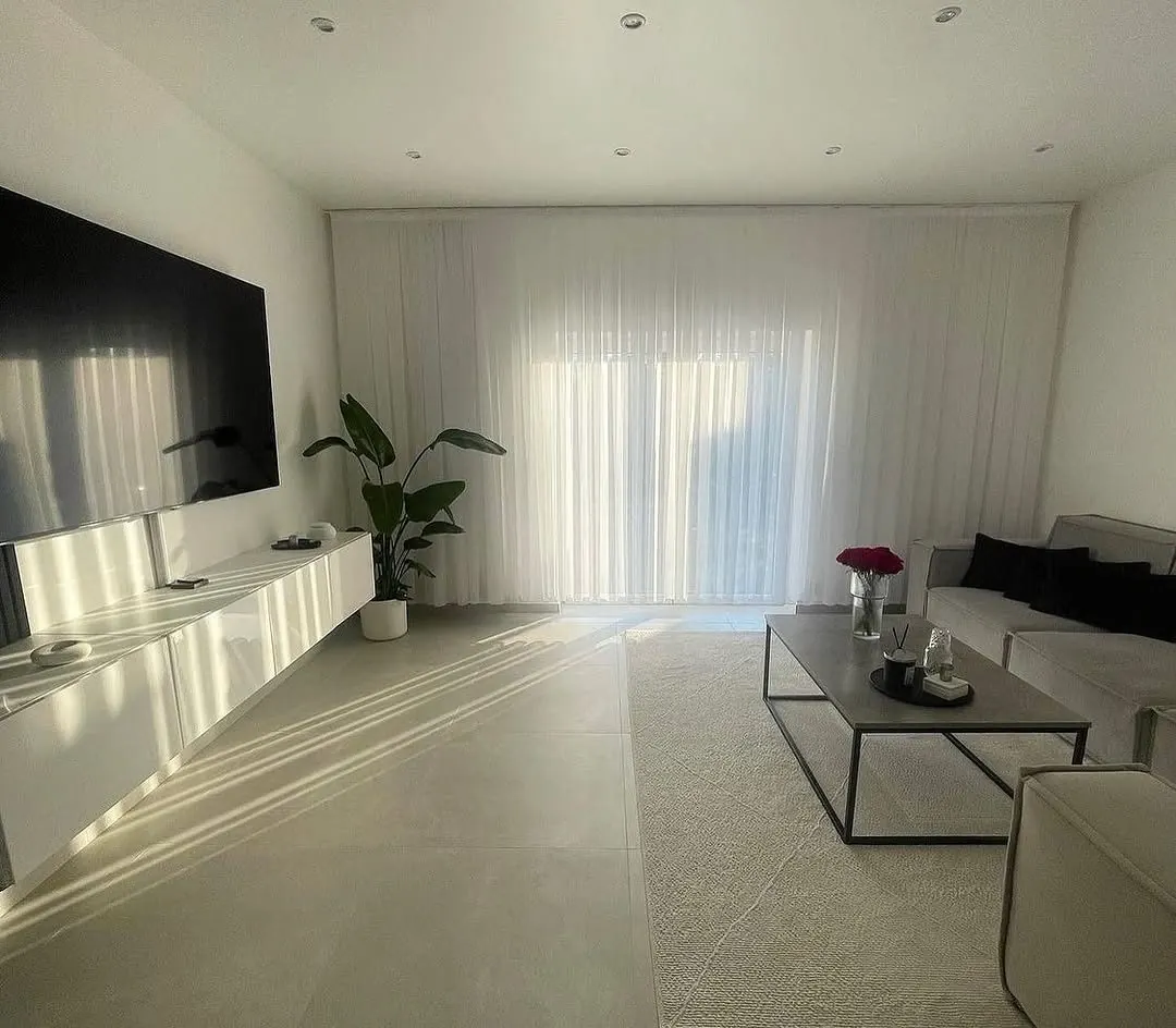 Living room with custom TV wall